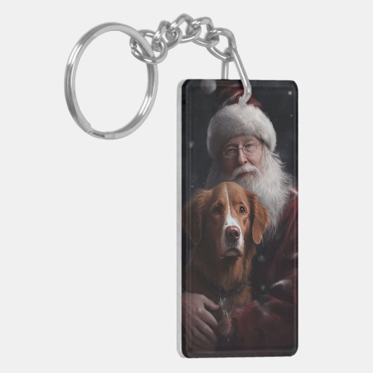 Nova Scotia Duck Toller mit dem Weihnachtsmann fei Schlüsselanhänger (Vorderseite links)