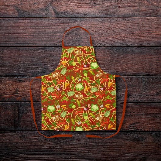 Nudeln und buntes Gemüse, rot braun Schürze