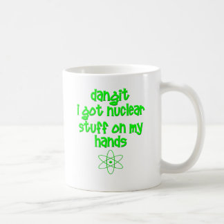 Nukleares Material auf Händen Kaffeetasse