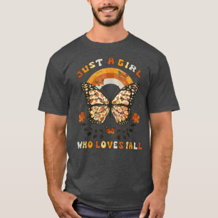 Nur ein Mädchen, das die Vintagen Regenbogen im He T-Shirt