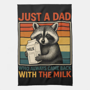 Nur ein Vater, der immer wieder mit der Milch zurü Geschirrtuch