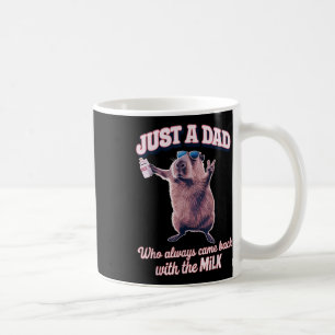 Nur ein Vater, der immer wieder mit der Milch zurü Kaffeetasse