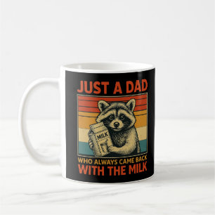 Nur ein Vater, der immer wieder mit der Milch zurü Kaffeetasse