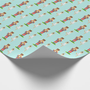 Nussknacker und Balletttänzer auf hellblauem Hinte Geschenkpapier