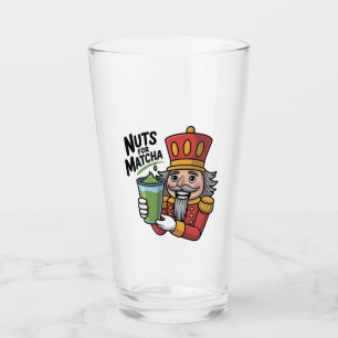 Nutcracker hält Matcha Latte Lustige Nüsse für Mat Glas