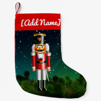 Nutcracker Toysoldat in roter Uniform Kleiner Weihnachtsstrumpf