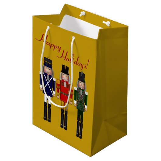 Nutcracker Trio-Gold-GIFT BAG Mittlere Geschenktüte (Vorderseite Schrägansicht)