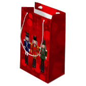Nutcracker Trio-Red Bokeh-GIFT BAG S Kleine Geschenktüte (Rückseite Schrägansicht)