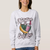 "Nutrition is Self-Liebe" Premium Unisex Longsleev Sweatshirt (Vorderseite)
