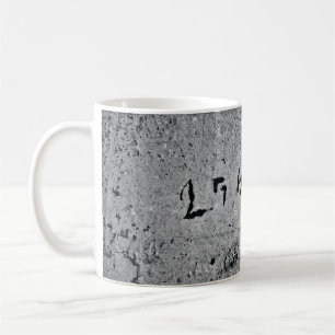 Oberfläche aus schwarzem und grauem Beton Kaffeetasse