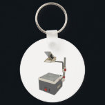 OHP 80er 90s Overhead Projektor Schlüsselanhänger<br><div class="desc">Die unvergesslichen Overhead-Projektoren waren in den 70er,  80er und 90er Jahren für tausende von Menschen ein Teil des Studentenlebens. Wenn Nostalgie Ihr Ding ist,  ist dies ein lustiges Produkt zu kaufen.</div>