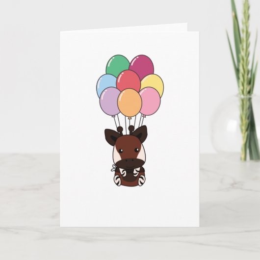 Okapi fliegt mit farbenfrohen Ballons Karte (Vorderseite)