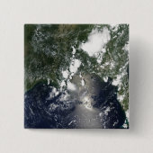 Öl breitet sich nordöstlich aus button (Vorderseite)