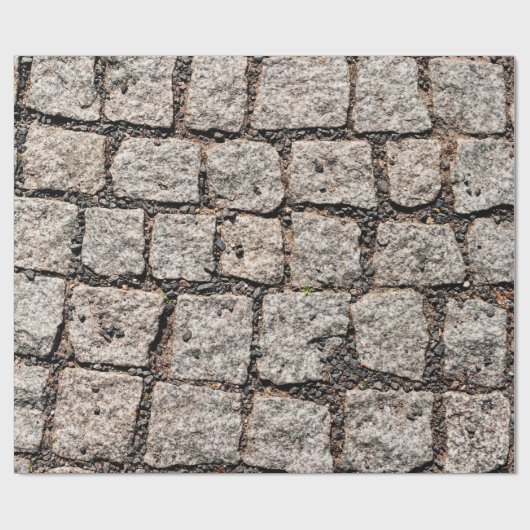 Old cobble stone pattern at the streetabstract,anc geschenkpapier (Flach)