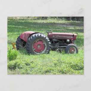 Old Damaged Little Tractor in A Field Postkarte