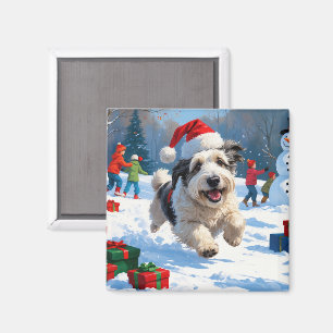 Old English Sheepdog läuft im Schnee mit Weihnacht Magnet