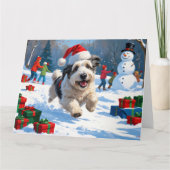 Old English Sheepdog läuft in Snow Weihnachtshut Karte (Vorderseite)