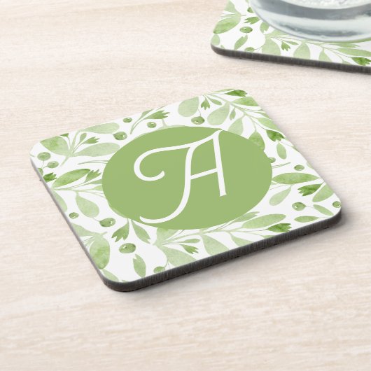 Olivenblätter und initiale Getränkeuntersetzer (Linke Seite)