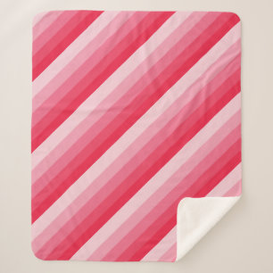 Ombre diagonale Streifen in Rot bis Rosa Sherpadecke