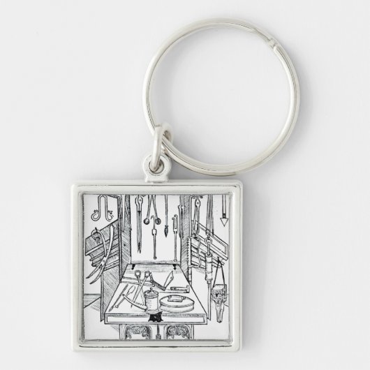 Operationstisch und chirurgische Instrumente, von Schlüsselanhänger (Vorne)