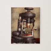 Optometrie - Linsenschneidemaschine Puzzle (Vertikal)