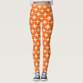 Orange Background Fleur-de-lis Muster Design Leggings (Vorderseite)