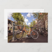 Orange bike in Amsterdam Niederlande Postkarte (Vorne/Hinten)