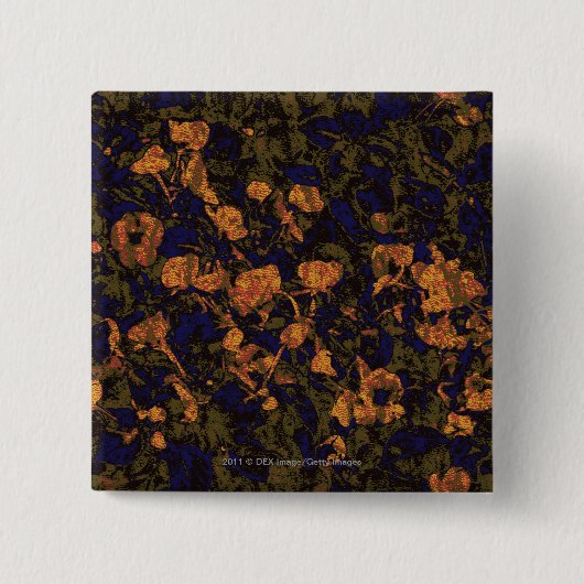 Orange Blume gegen Blatttarnungsmuster Button (Vorderseite)