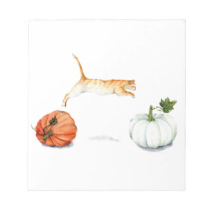 Orange Cat Jumping between Pumpkins Notizblock