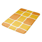 orange gelbe Formen Quadrate fett asymmetrisch Badematte (Schrägansicht)