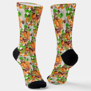 Orange grüne rote Kaugummibonbons gestreut Zuckerm Socken