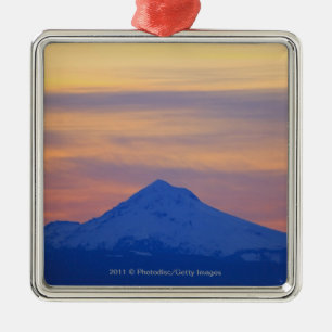 Orange Himmel-Schnee mit einer Kappe bedeckter Silbernes Ornament