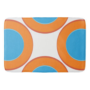 Orange in den blauen Punkten Badematte