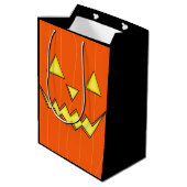 Orange Jack-o-Lantern-Geschenktasche zu Halloween  Mittlere Geschenktüte (Rückseite Schrägansicht)