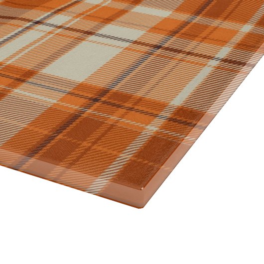 Orange kariertes schneidebrett (Ecke)