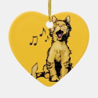 Orange Katze des niedlichen Gesangs, die mit Keramikornament