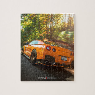 Orange Nissan GT-R, das durch Seattle-Straßen Puzzle