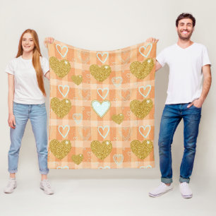 Orange Pastell-Herzstreifen mit goldenen Akzenten Fleecedecke
