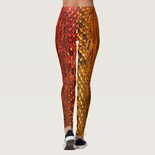 Orange Schlangenhautart legging. Leggings (Rückseite)