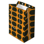 Orange Schwarze Kreise Mittlere Geschenktüte (Rückseite Schrägansicht)