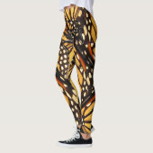 Orange schwarze Monarch-Schmetterlings-abstrakte Leggings (Links)