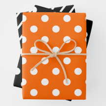 Orange, schwarze und weiße Geschenkpapierbögen
