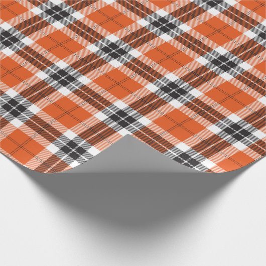 Orange schwarzer Tartan-kariertes schottisches Geschenkpapier (Ecke)