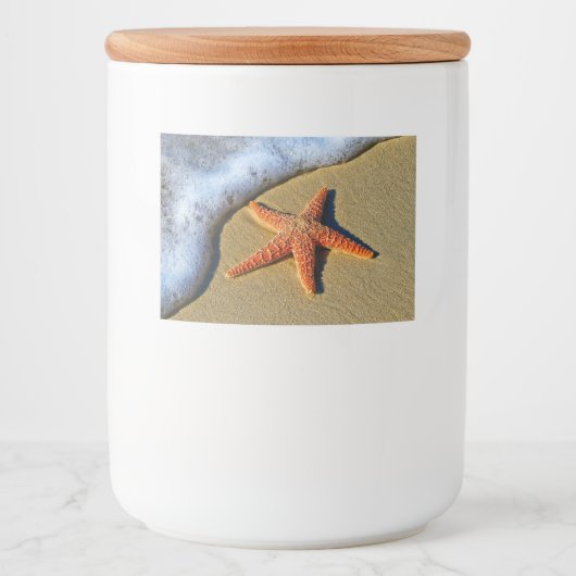 Orange Starfish am Strand Lebensmitteletikett (Vorderseite)