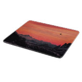 Orange Sunset Bird in Sky Schneidebrett (Ecke)