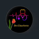Orange Tulip Heartbeat Stethoscope Medical Button<br><div class="desc">Orange Tulip Heartbeat Stethoscope Medical Button feature a beautiful single orange tulip, stylish stethoscope graphic , heartbeat and a stylish name template in black background.A perfekt design for Doctors , nurse , health worker or for medical staff .Please click 1 button to customize it with your text .kindly visit my...</div>