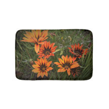 Orange und Black Gazanias Bath Mat