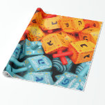 Orange und Blue Dreidels Geschenkpapier<br><div class="desc">Foto von farbenfrohen orangen und blauen dreiköpfigen. Bild von Adiel lo,  wikicommons.</div>