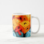 Orange und Blue Dreidels Kaffeetasse<br><div class="desc">Foto von farbenfrohen orangen und blauen dreiköpfigen. Bild von Adiel lo,  wikicommons.</div>