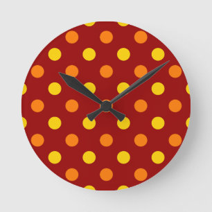 Orange und gelbe Punkte auf Rot Runde Wanduhr